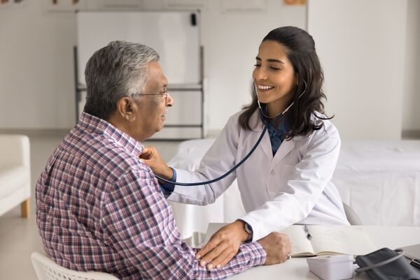 Latin,Cardiologist,Check,Heart,Rate,Of,Older,Male,Patient,With